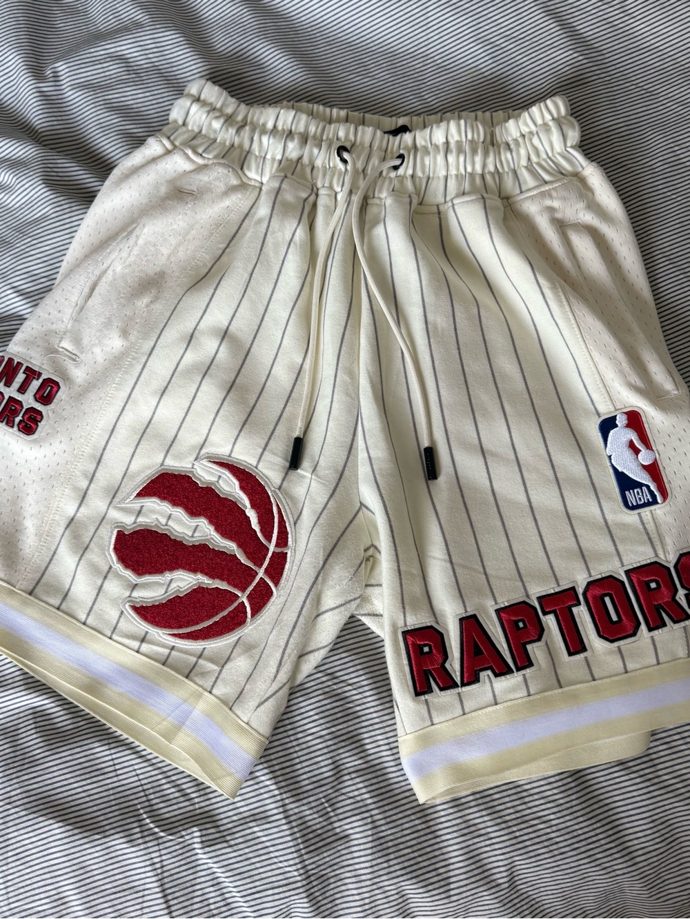 NBA Toronto Raptors Cream Pinstripe Shorts with Red Detailing
